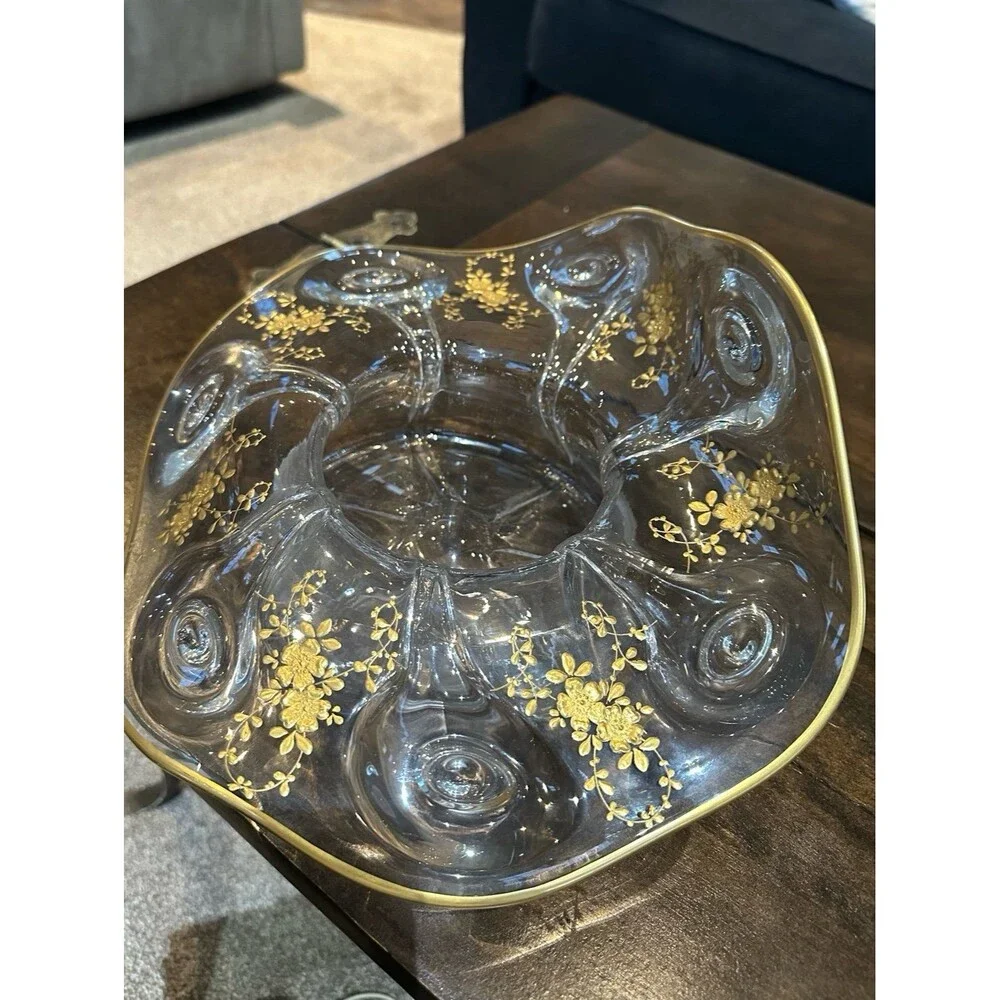 Decorative glass bowl with gold flowers